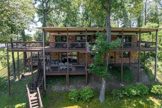 121 Atkinson Ln, Hot Springs, AR 71913 - rear view of house featuring a ceiling fan, stairway, and a deck
