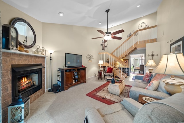 173-B Pebble Beach Pl, Hot Springs, AR 71913 - carpeted living area featuring a fireplace, stairs, a ceiling fan, recessed lighting, and a high ceiling