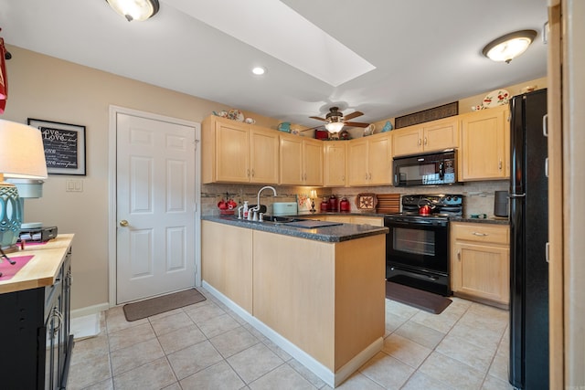 173-B Pebble Beach Pl, Hot Springs, AR 71913 - kitchen featuring black appliances, light brown cabinets, a skylight, and decorative backsplash