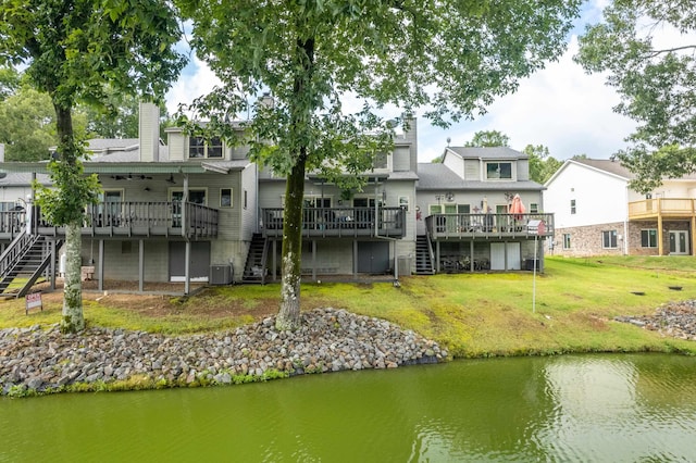 173-B Pebble Beach Pl, Hot Springs, AR 71913 - rear view of property featuring stairs, a deck with water view, and a lawn