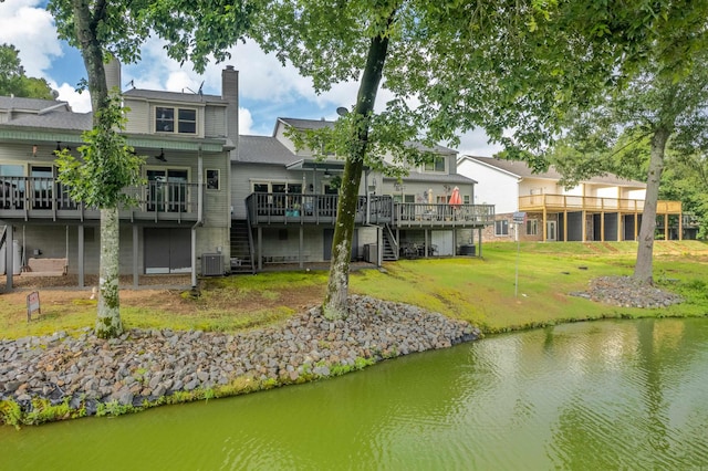 173-B Pebble Beach Pl, Hot Springs, AR 71913 - rear view of property with stairway, a deck with water view, ceiling fan, a yard, and a chimney