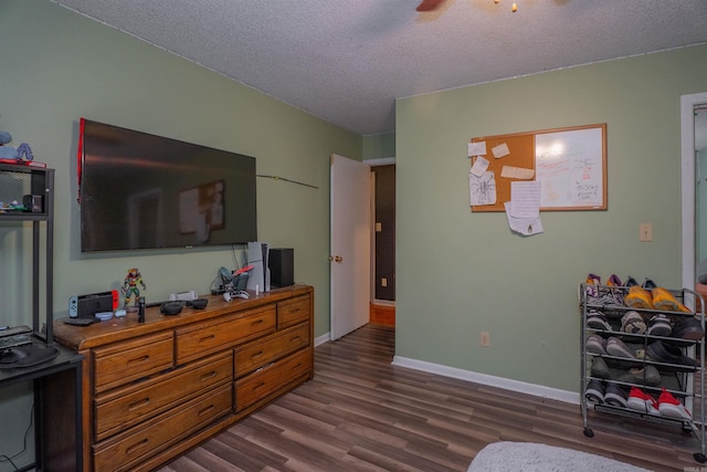 103 N Greer Dr, Searcy, AR 72143 - bedroom featuring dark wood-style floors and a textured ceiling