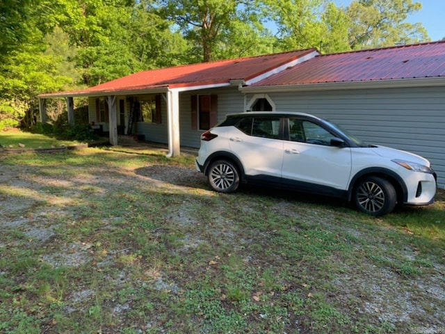 455 Gifford Rd, Malvern, AR 72104 - view of home's exterior featuring a metal roof and a yard