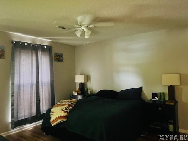 4 Brookway Ln, North Little Rock, AR 72120 - bedroom featuring wood finished floors and a ceiling fan