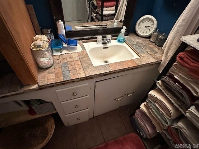 1901 S Buerkle St, Stuttgart, AR 72160 - bathroom with vanity and tile patterned flooring
