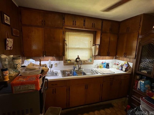 1901 S Buerkle St, Stuttgart, AR 72160 - kitchen with light countertops and brown cabinets