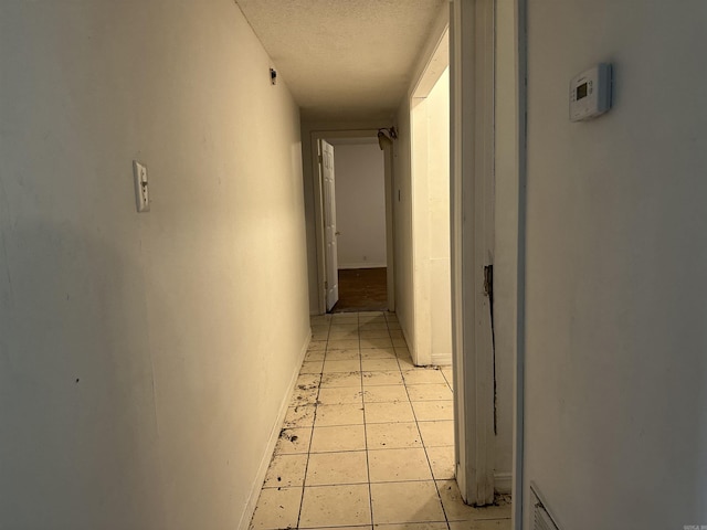 109 Randallwood Dr, Hot Springs Village, AR 71909 - hall featuring a textured ceiling and light tile patterned floors