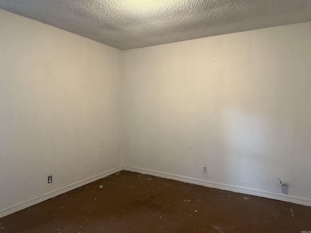 109 Randallwood Dr, Hot Springs Village, AR 71909 - empty room featuring unfinished concrete floors and a textured ceiling