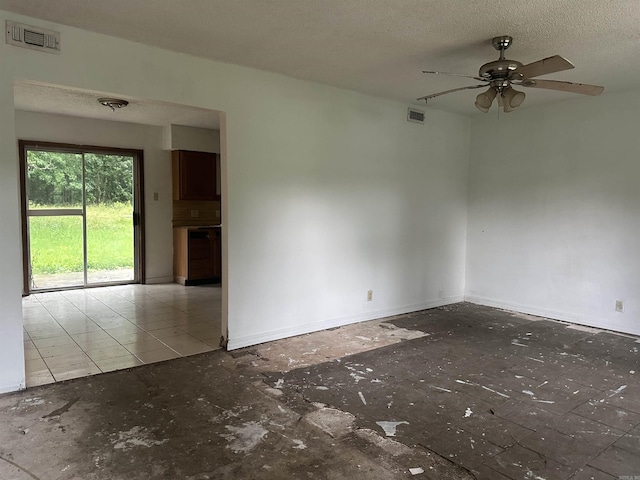 109 Randallwood Dr, Hot Springs Village, AR 71909 - empty room with ceiling fan and a textured ceiling