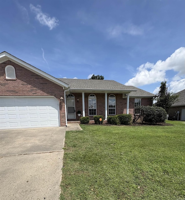 1901 N 19th St, Paragould, AR 72450 - single story home featuring driveway, a front lawn, brick siding, and a shingled roof