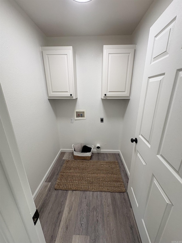 1901 N 19th St, Paragould, AR 72450 - laundry room featuring cabinet space, hookup for an electric dryer, dark wood-style floors, and washer hookup