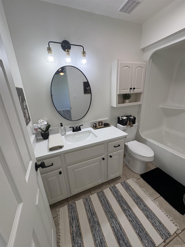 1901 N 19th St, Paragould, AR 72450 - full bath with tile patterned floors, vanity, and shower / bathtub combination
