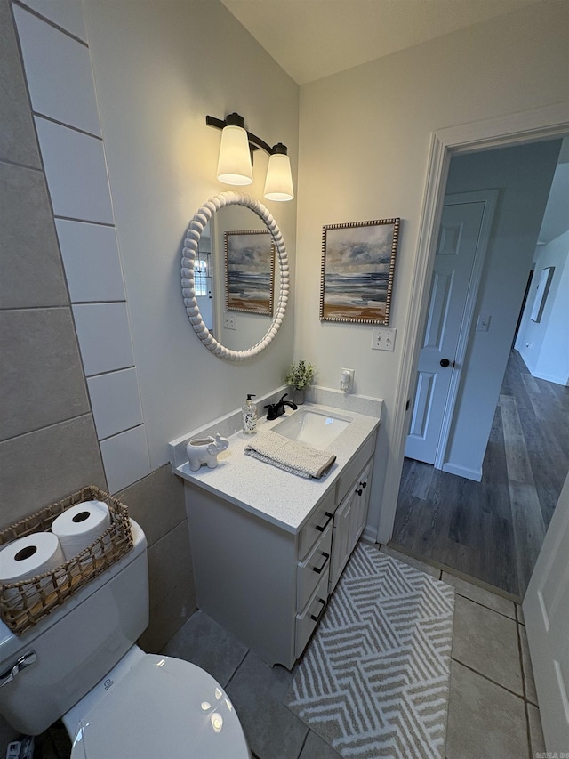 1901 N 19th St, Paragould, AR 72450 - bathroom featuring tile walls, vanity, and tile patterned floors