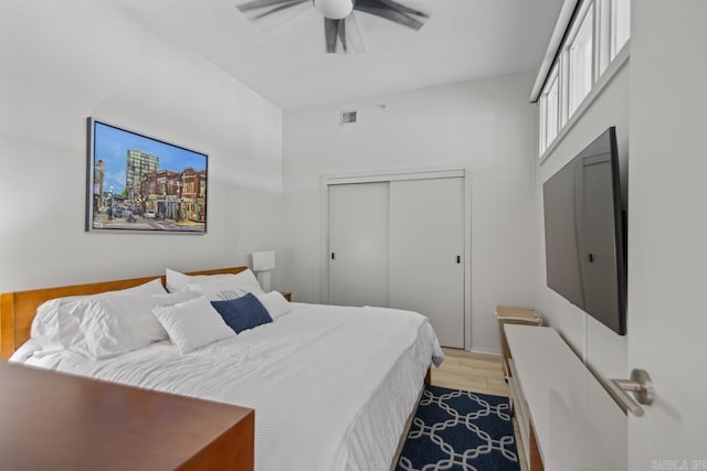 300 E Third St # 509, Little Rock, AR 72201 - bedroom featuring a closet, light wood-style floors, and ceiling fan