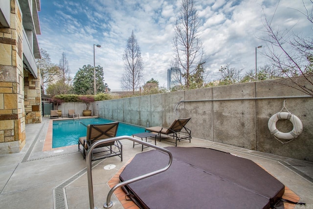 300 E Third St # 509, Little Rock, AR 72201 - view of swimming pool featuring a fenced backyard and a patio area