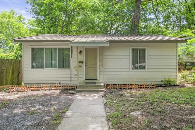 117 N Summit St, Little Rock, AR 72205 - view of front of house featuring entry steps and a metal roof