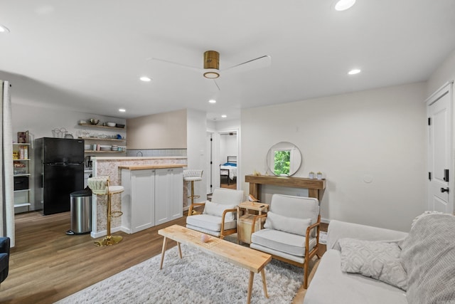 117 N Summit St, Little Rock, AR 72205 - living room featuring wood finished floors, ceiling fan, and recessed lighting