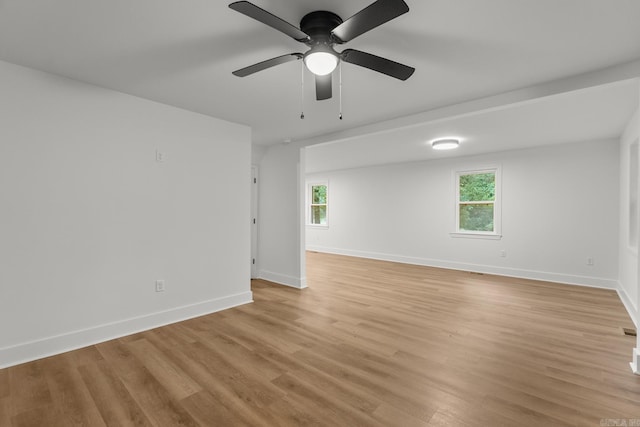 25501 Kanis Rd, Little Rock, AR 72223 - unfurnished room featuring light wood-style flooring, plenty of natural light, and a ceiling fan