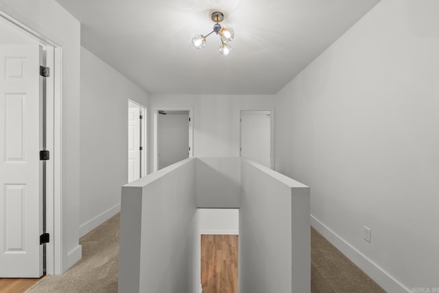 25501 Kanis Rd, Little Rock, AR 72223 - corridor featuring an upstairs landing and light carpet