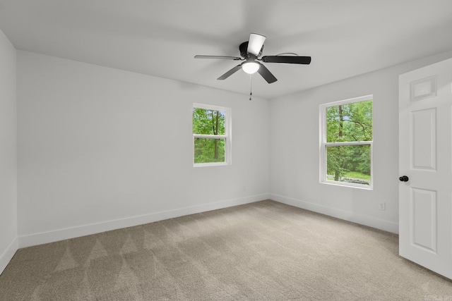 25501 Kanis Rd, Little Rock, AR 72223 - carpeted spare room with baseboards and a ceiling fan