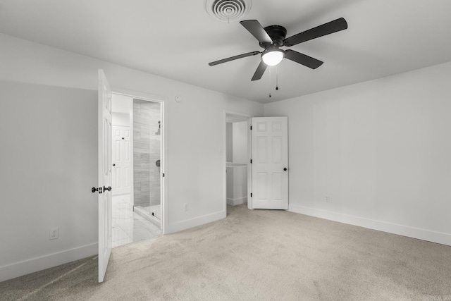 25501 Kanis Rd, Little Rock, AR 72223 - unfurnished bedroom featuring carpet floors, connected bathroom, and a ceiling fan
