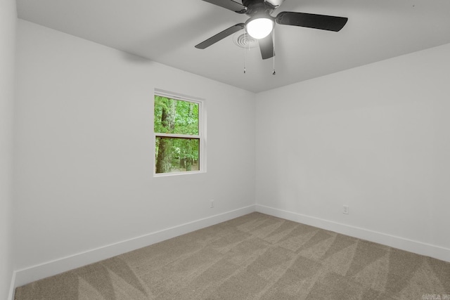 25501 Kanis Rd, Little Rock, AR 72223 - carpeted empty room with baseboards and a ceiling fan