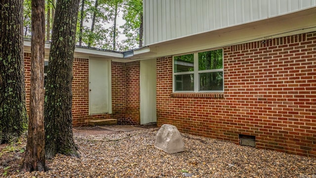 25501 Kanis Rd, Little Rock, AR 72223 - view of side of home with crawl space, brick siding, and entry steps