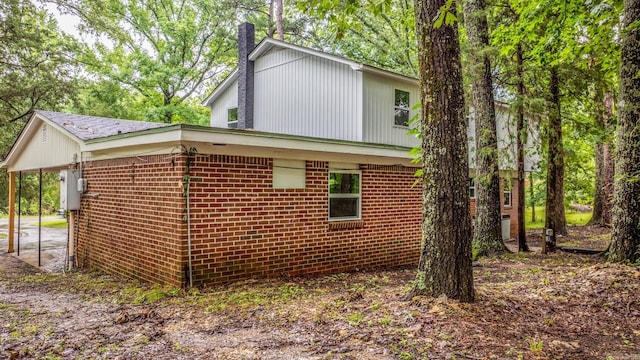 25501 Kanis Rd, Little Rock, AR 72223 - view of property exterior with brick siding and a carport