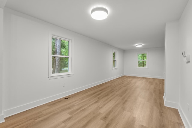 25501 Kanis Rd, Little Rock, AR 72223 - unfurnished room with light wood finished floors and baseboards