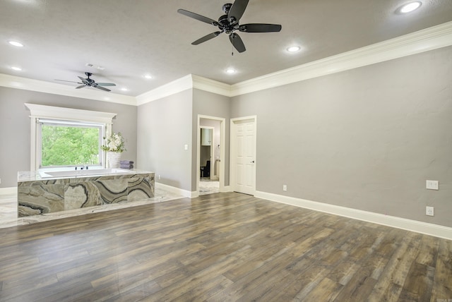 unfurnished living room with a ceiling fan, wood finished floors, crown molding, and recessed lighting
