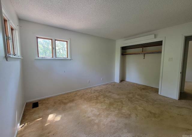 1 Sierra Ln, Hot Springs Village, AR 71909 - unfurnished bedroom featuring carpet flooring, a closet, and a textured ceiling