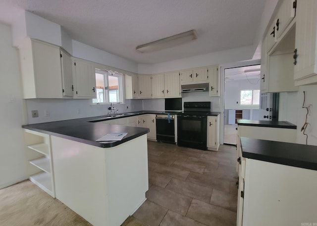 1 Sierra Ln, Hot Springs Village, AR 71909 - kitchen with black appliances, range hood, dark countertops, and a peninsula
