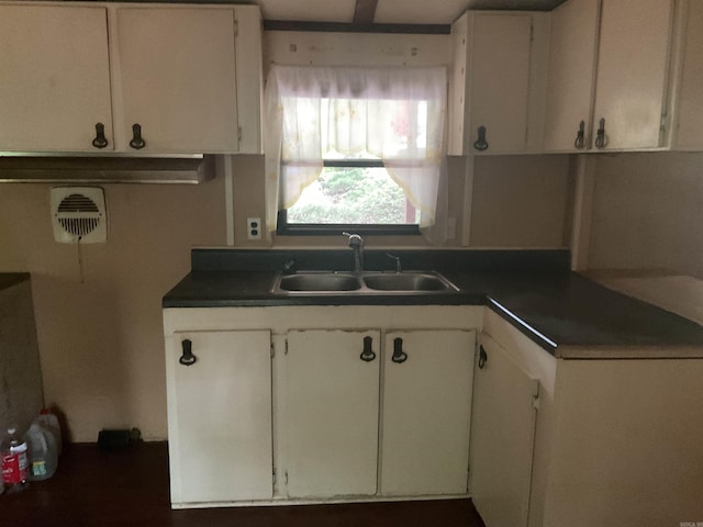 39 Holley Rd, Edgemont, AR 72044 - kitchen featuring white cabinets and dark countertops