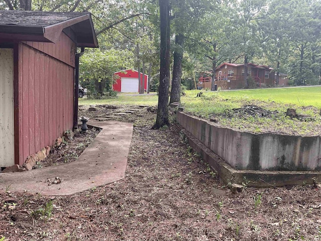 39 Holley Rd, Edgemont, AR 72044 - view of yard featuring an outbuilding and a detached garage
