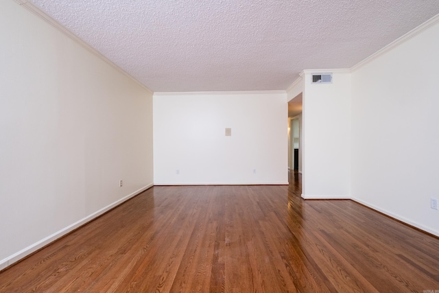 520 Cambridge Place Dr, Little Rock, AR 72227 - spare room featuring wood finished floors, a textured ceiling, and crown molding