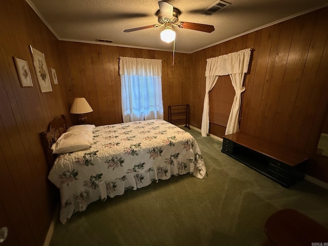 209 Crouch St, Benton, AR 72015 - carpeted bedroom featuring wood walls, a ceiling fan, and crown molding