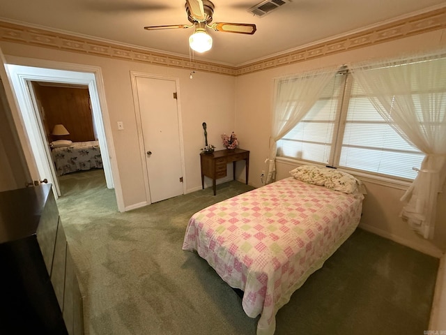 209 Crouch St, Benton, AR 72015 - carpeted bedroom with ceiling fan and baseboards