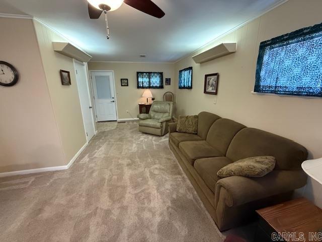 209 Crouch St, Benton, AR 72015 - carpeted living area featuring ornamental molding and ceiling fan