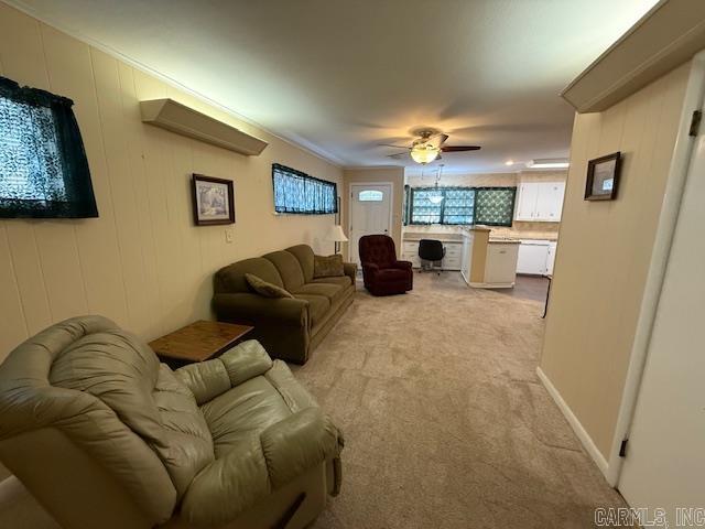 209 Crouch St, Benton, AR 72015 - living area with light colored carpet and a ceiling fan