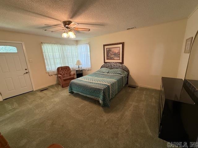 209 Crouch St, Benton, AR 72015 - carpeted bedroom featuring a textured ceiling and ceiling fan