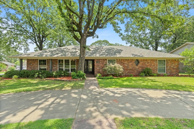 300 Beaconsfield Rd, Sherwood, AR 72120 - single story home with brick siding and a front yard