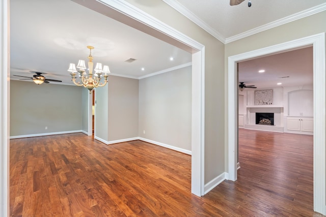 300 Beaconsfield Rd, Sherwood, AR 72120 - unfurnished room with a ceiling fan, ornamental molding, a chandelier, wood finished floors, and recessed lighting