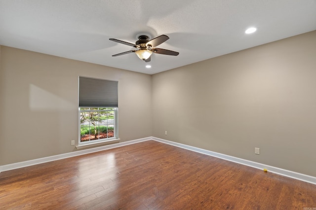 300 Beaconsfield Rd, Sherwood, AR 72120 - empty room featuring ceiling fan, dark wood-style flooring, and recessed lighting