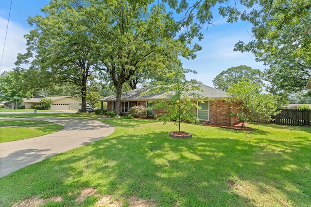 300 Beaconsfield Rd, Sherwood, AR 72120 - view of front of property with brick siding and a detached garage