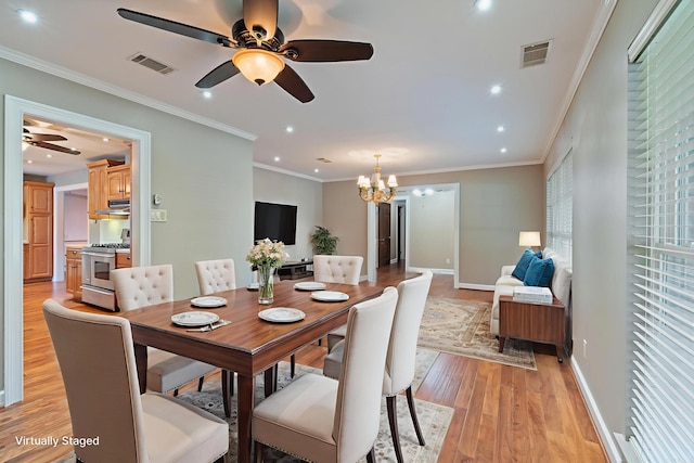 300 Beaconsfield Rd, Sherwood, AR 72120 - dining area with a ceiling fan, light wood-type flooring, a chandelier, crown molding, and recessed lighting