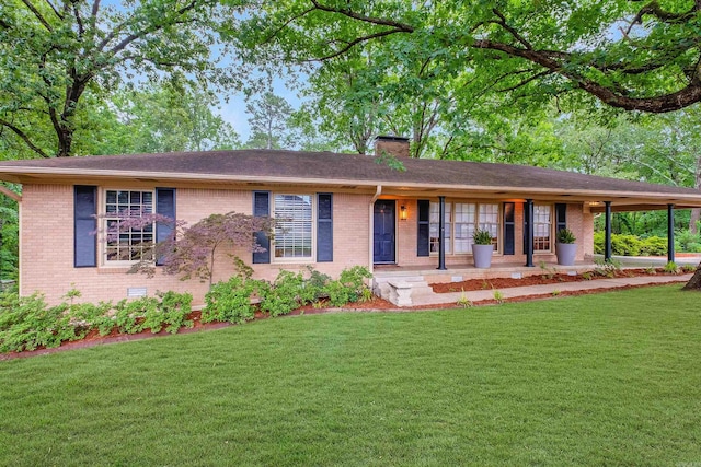 20 Robinwood Rd, Little Rock, AR 72227 - single story home with brick siding, a front yard, a porch, and a chimney