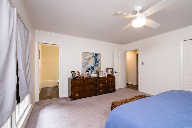 20 Robinwood Rd, Little Rock, AR 72227 - carpeted bedroom with ornamental molding, ensuite bathroom, and ceiling fan