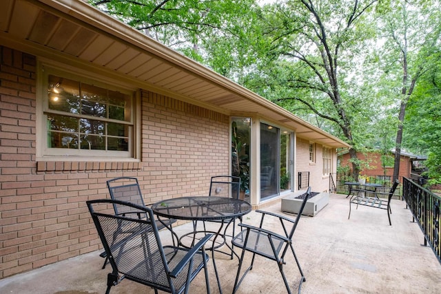 20 Robinwood Rd, Little Rock, AR 72227 - view of patio featuring outdoor dining area
