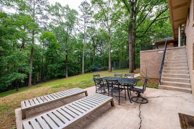 20 Robinwood Rd, Little Rock, AR 72227 - view of patio with outdoor dining space and stairs