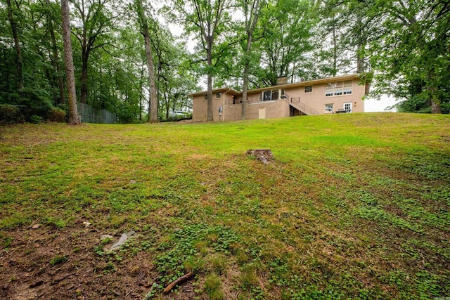 20 Robinwood Rd, Little Rock, AR 72227 - view of green lawn featuring stairway